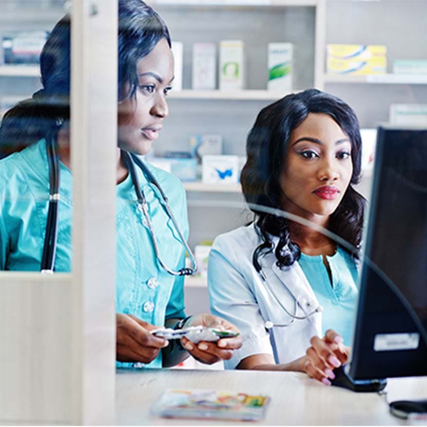 Pharmacists at a drug store